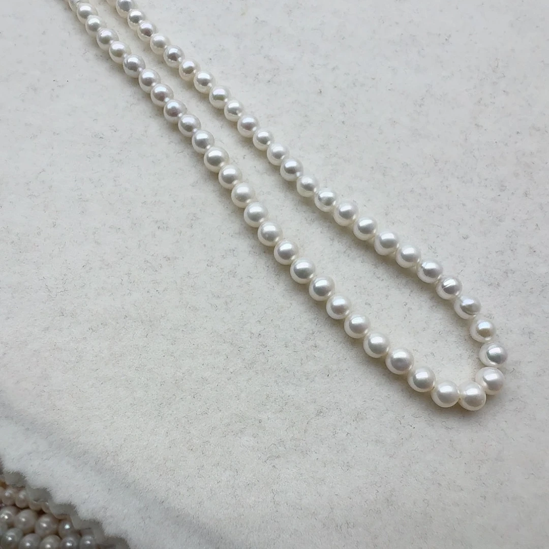 淡水珍珠颈饰银S925镶嵌5-6圆微微瑕元宝扣40厘米