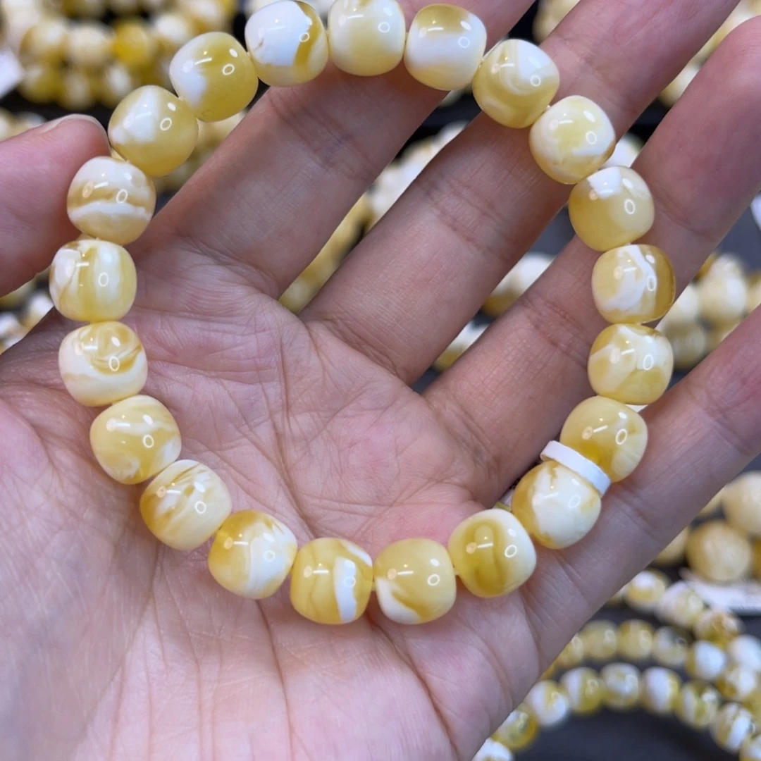 蜜蜡未镶嵌手串9.5x9mm金瓷白妖花