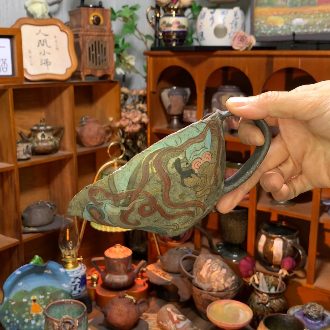 陶万***盼可明火手心里的敦煌公道杯