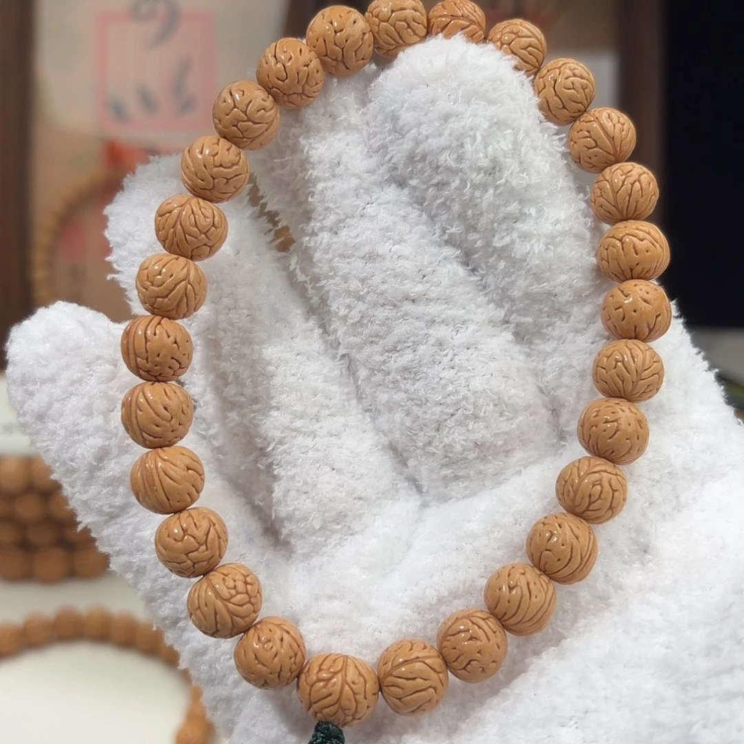 淡****桃核手串1.0加「大肠奶油」野生桃核手持