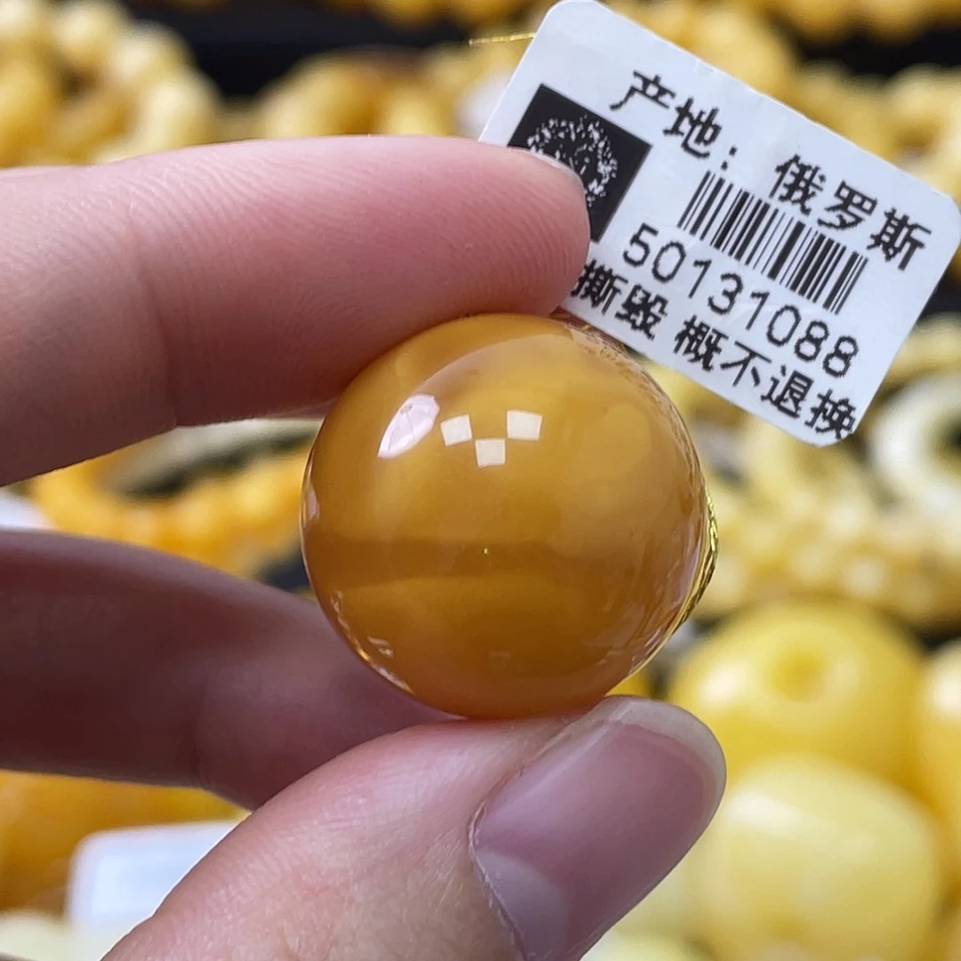 蜜蜡未镶嵌珠宝奇石20.6mm鸡油黄浓蜡飘花 瑕