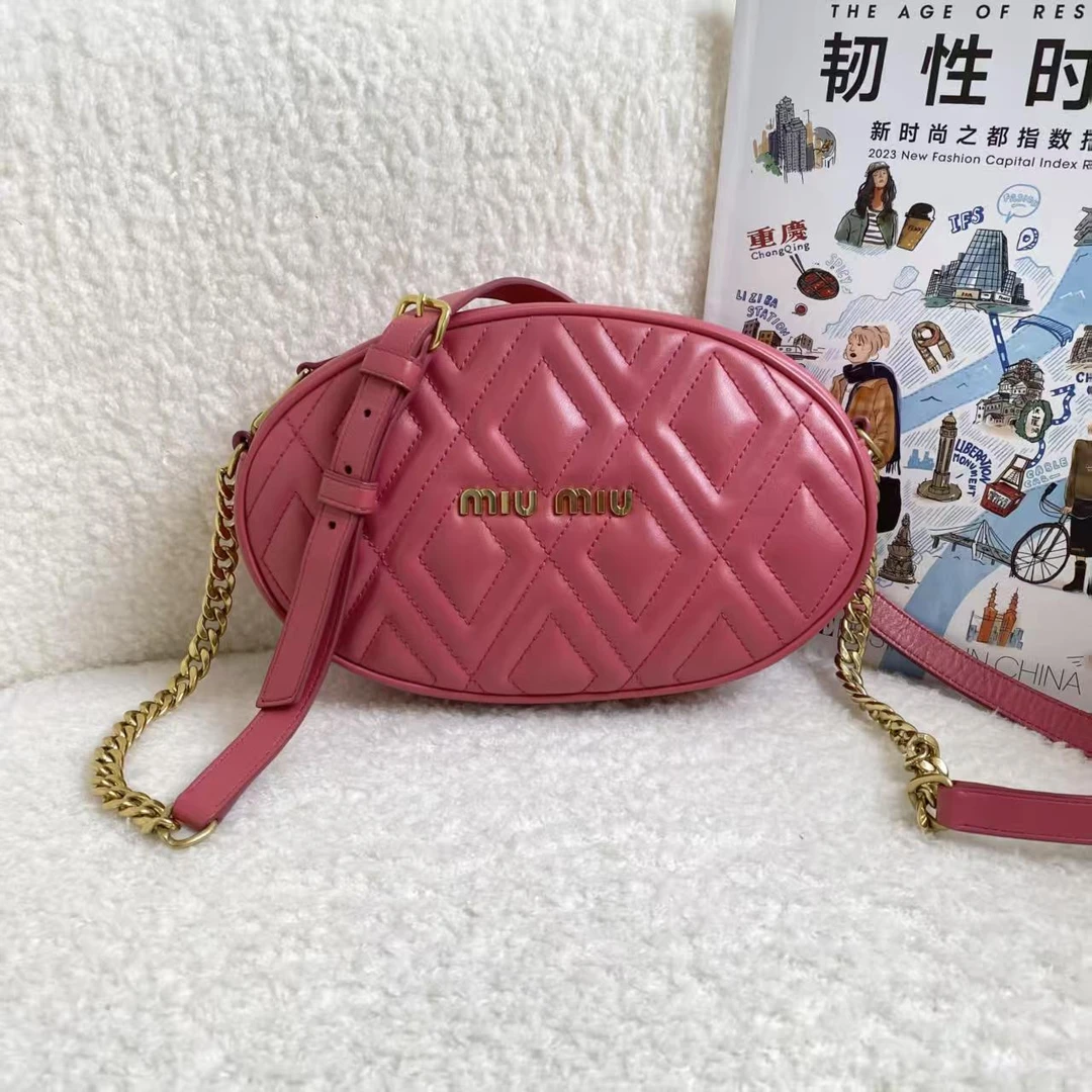 99新 MIU MIU/缪缪 粉色椭圆斜挎包/12期免息/ 52961582/代卖服务