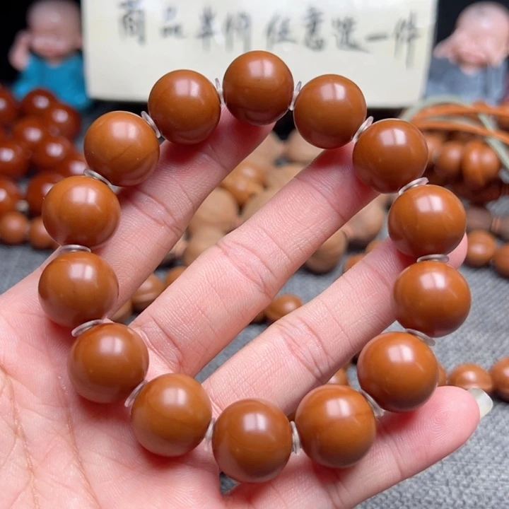 吴***人橄榄核手串1.5全品
