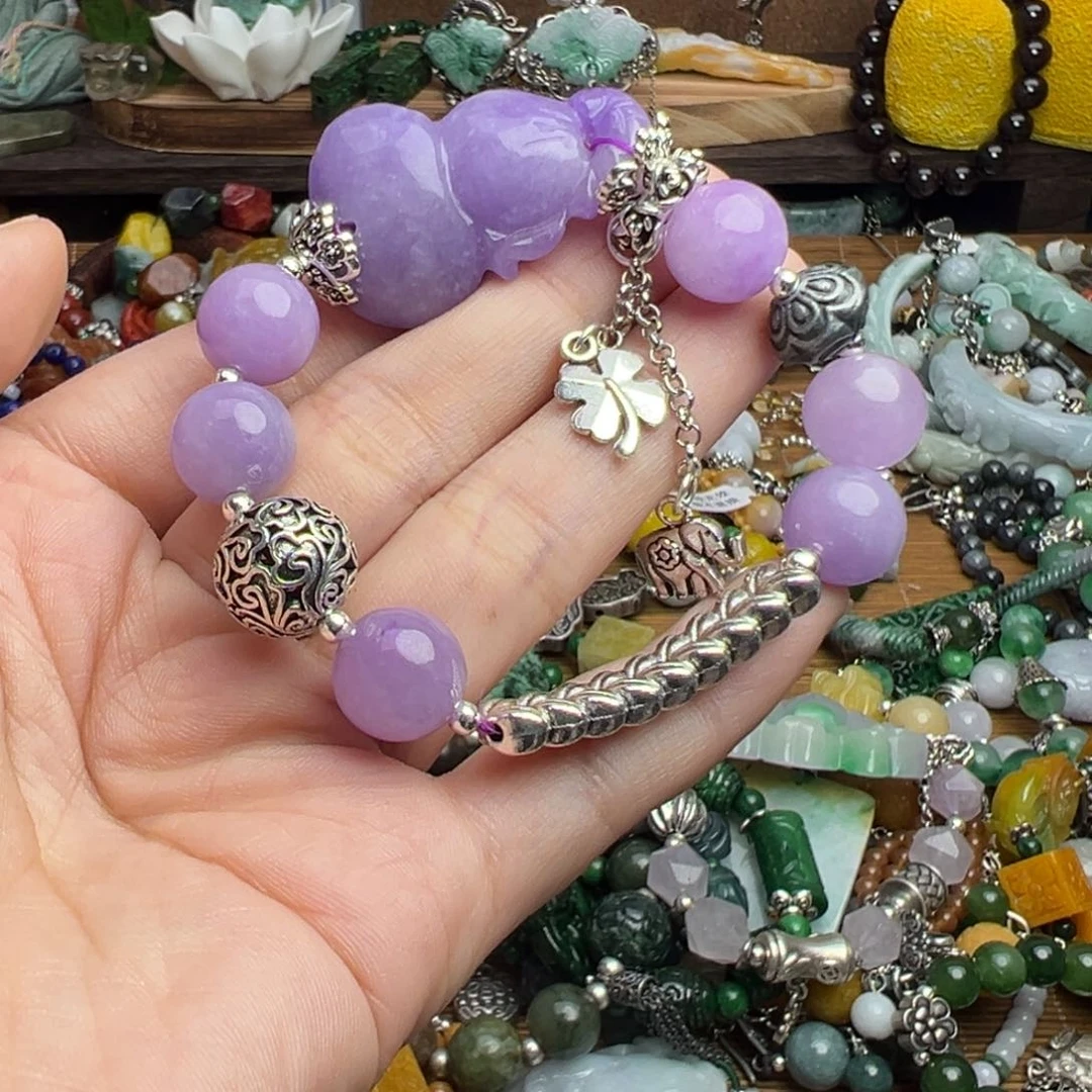 嫦****翡翠未镶嵌颈饰吊坠