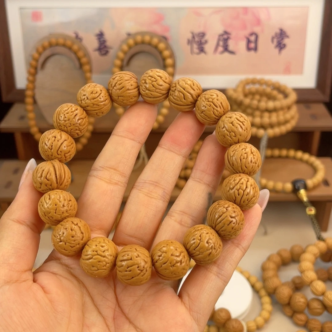 ****涛桃核吊坠桃核手持