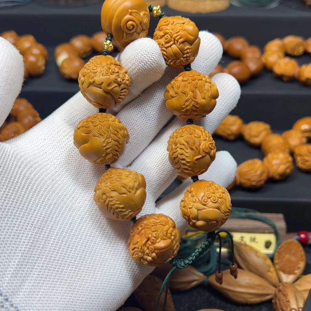 用***6橄榄核手串/手链2.4唐狮