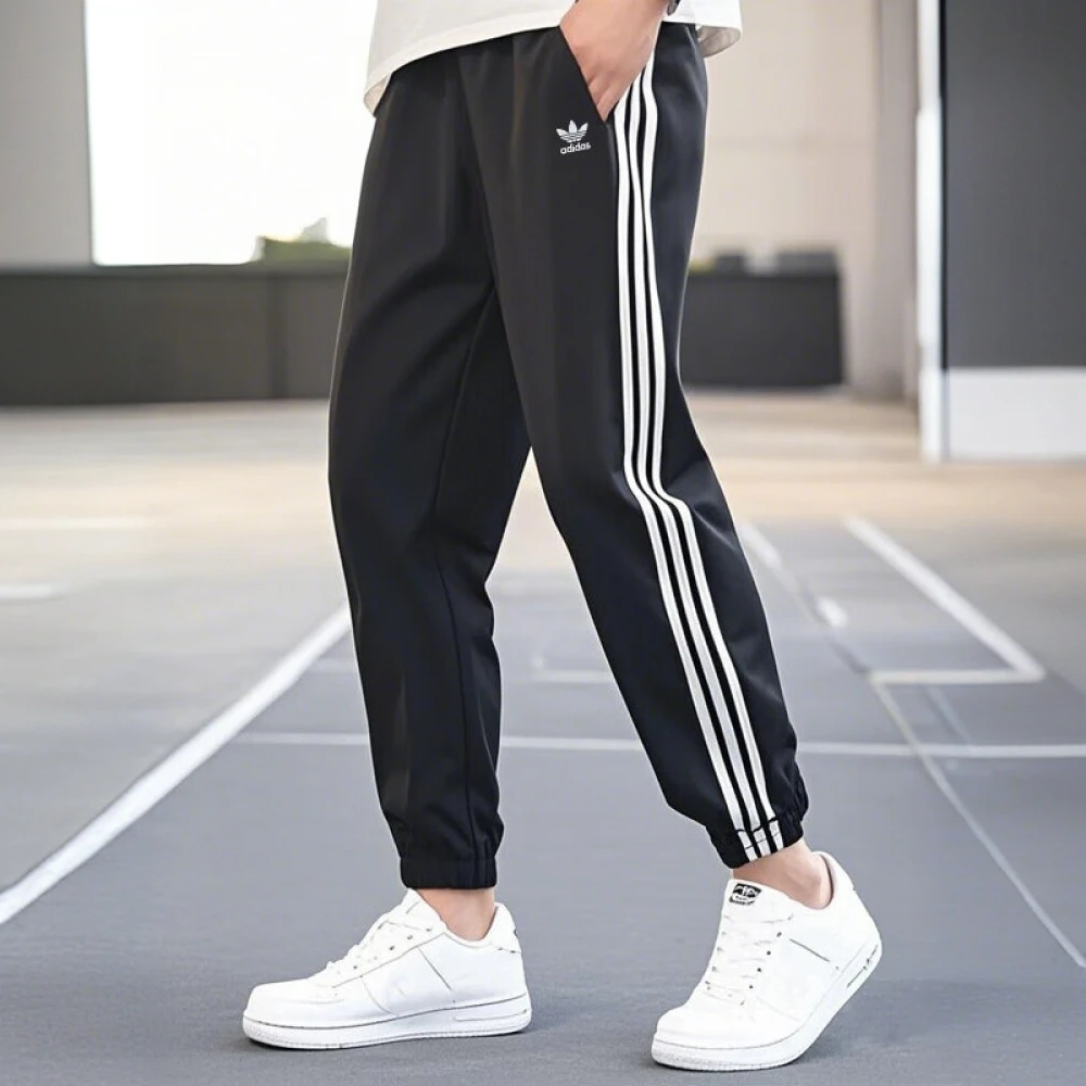 adidas阿迪达斯三叶草男裤梭织休闲裤子新款运动裤收口长裤IT2501
