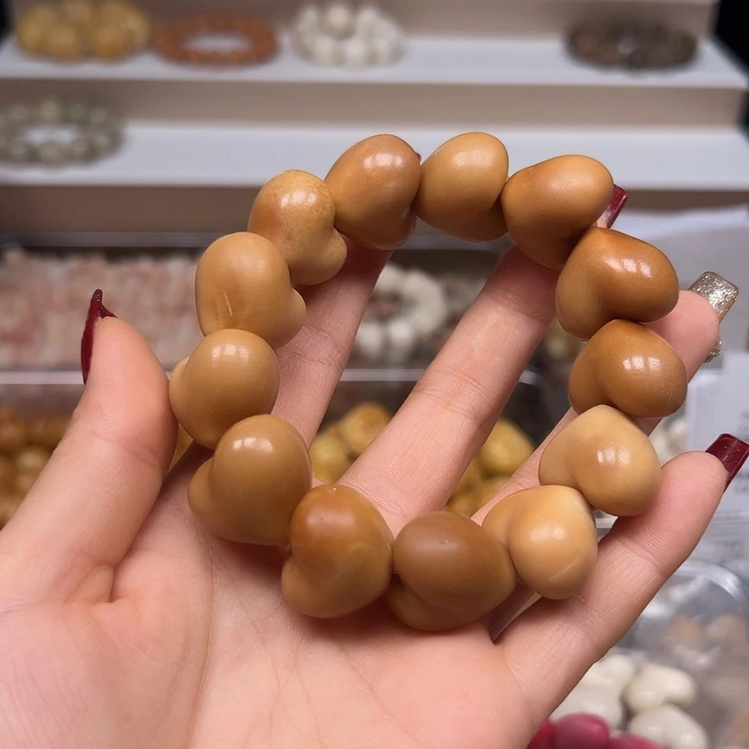 手串菩提根/象牙果瑕疵啦爱心13颗有裂有裂