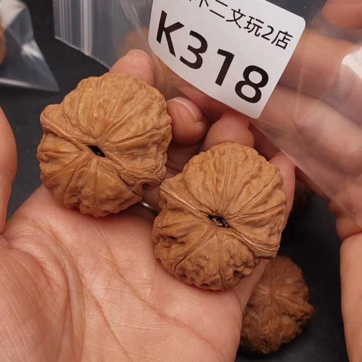 朗***波桃核吊坠K318元宝