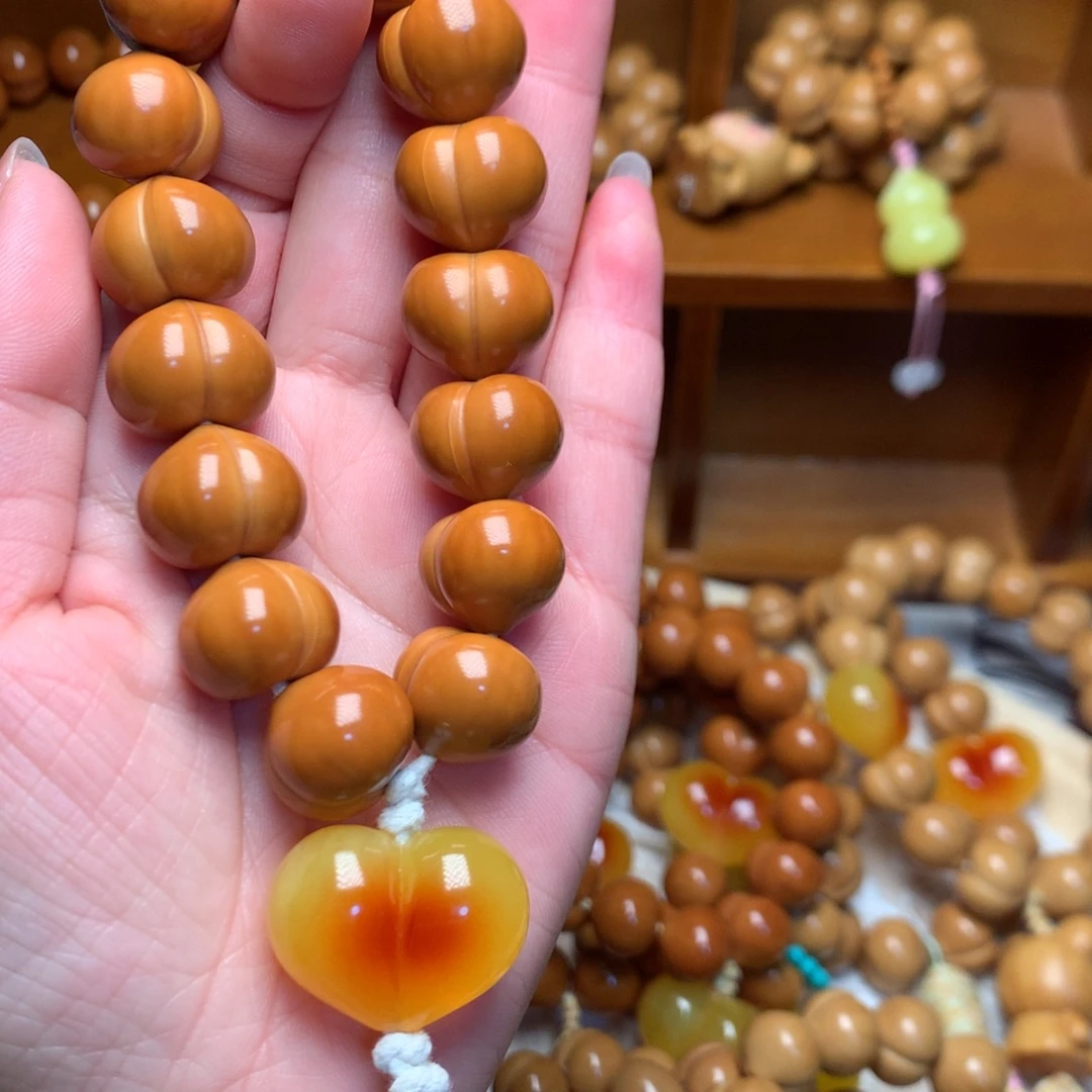 把件猴头核桃16玻璃底屁桃手持爱心