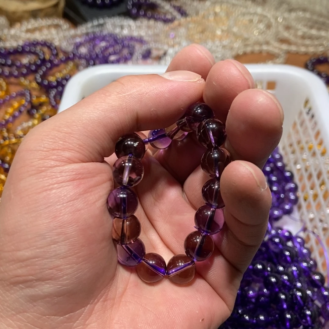 绍***理非金属10mm紫黄手串放漏款