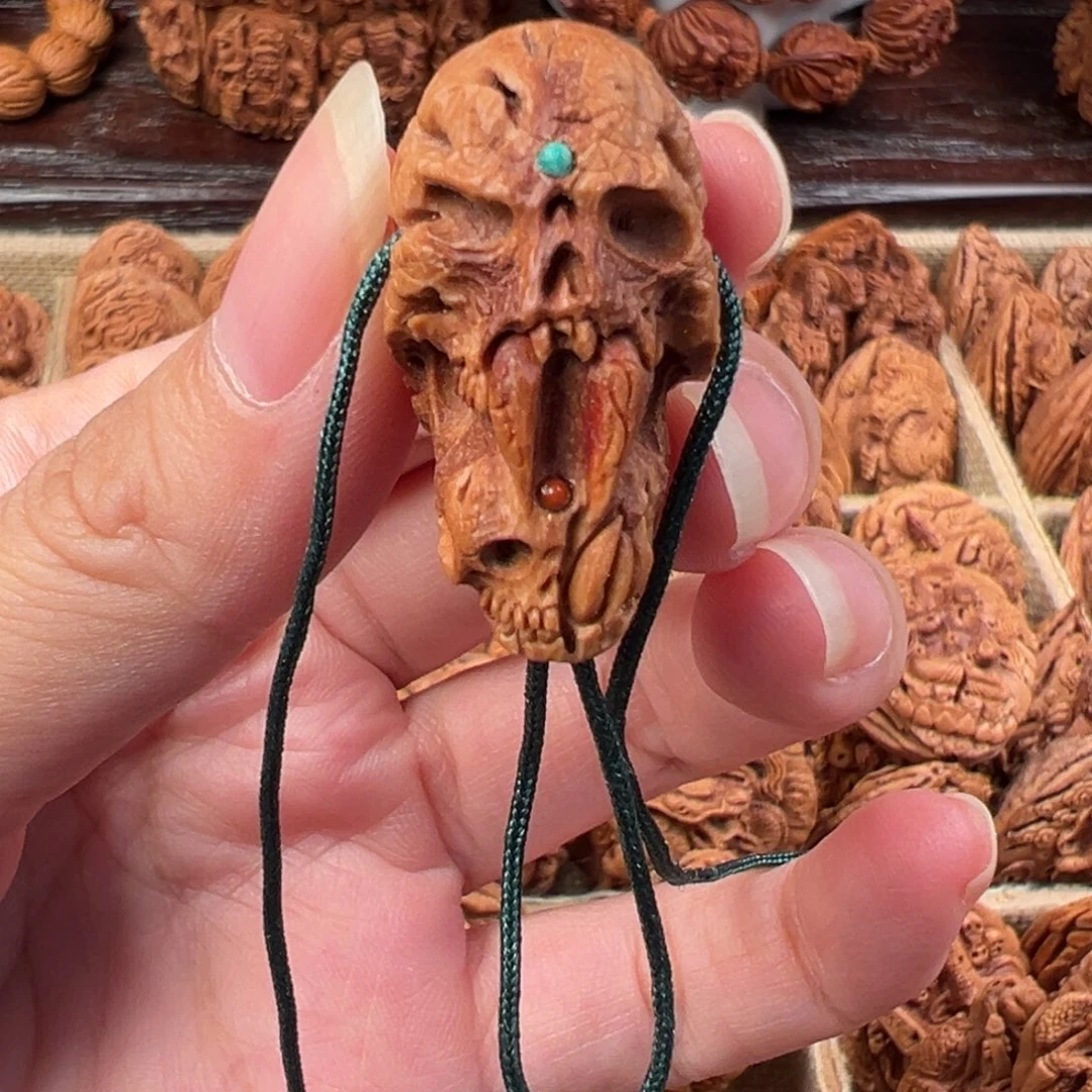 吊坠桃核桃核雕刻骷髅单籽（三通）