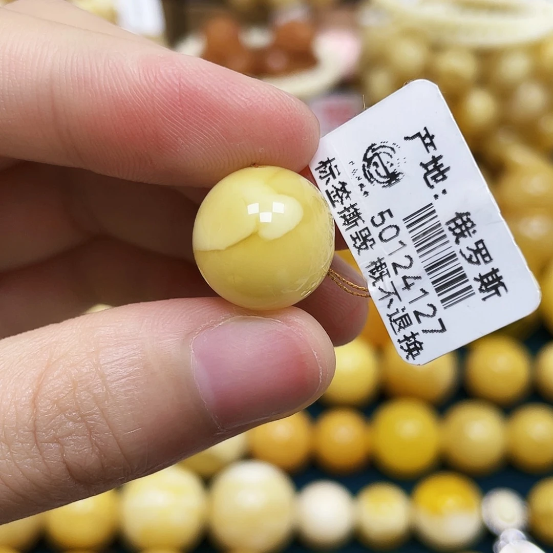 琥珀未镶嵌裸石14.3mm.瑕