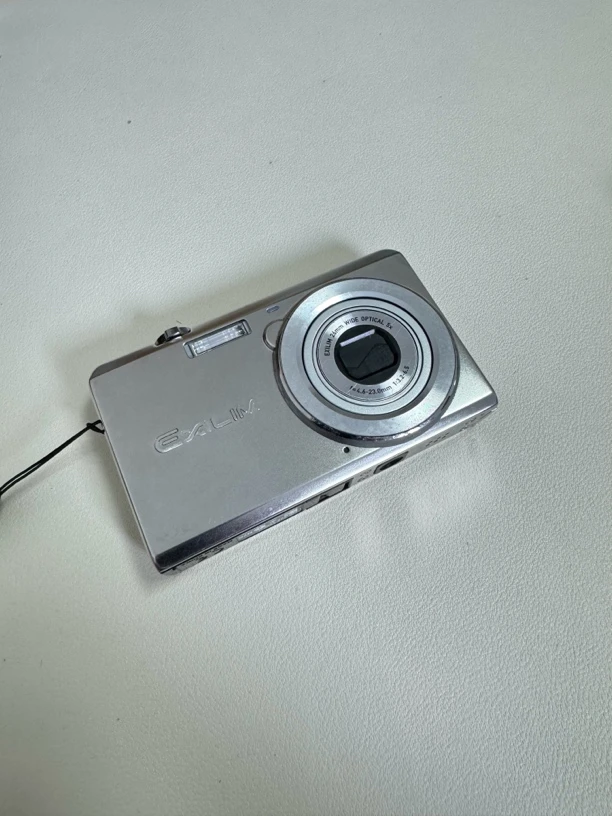 95新 Casio/卡西欧 卡西欧zs10 1410w像素5倍 换过电池盖