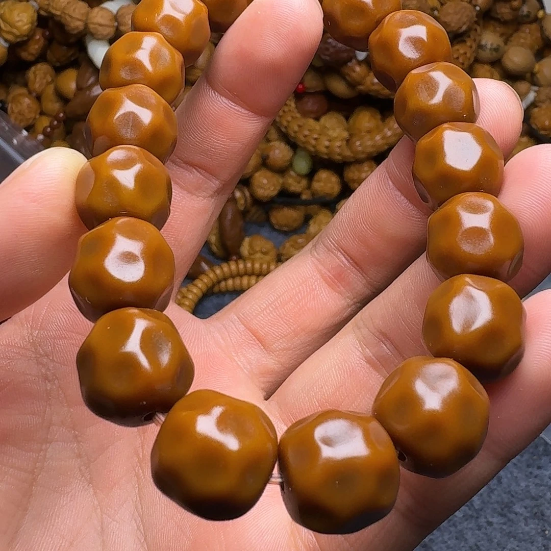 橄榄核手串咯哦哦