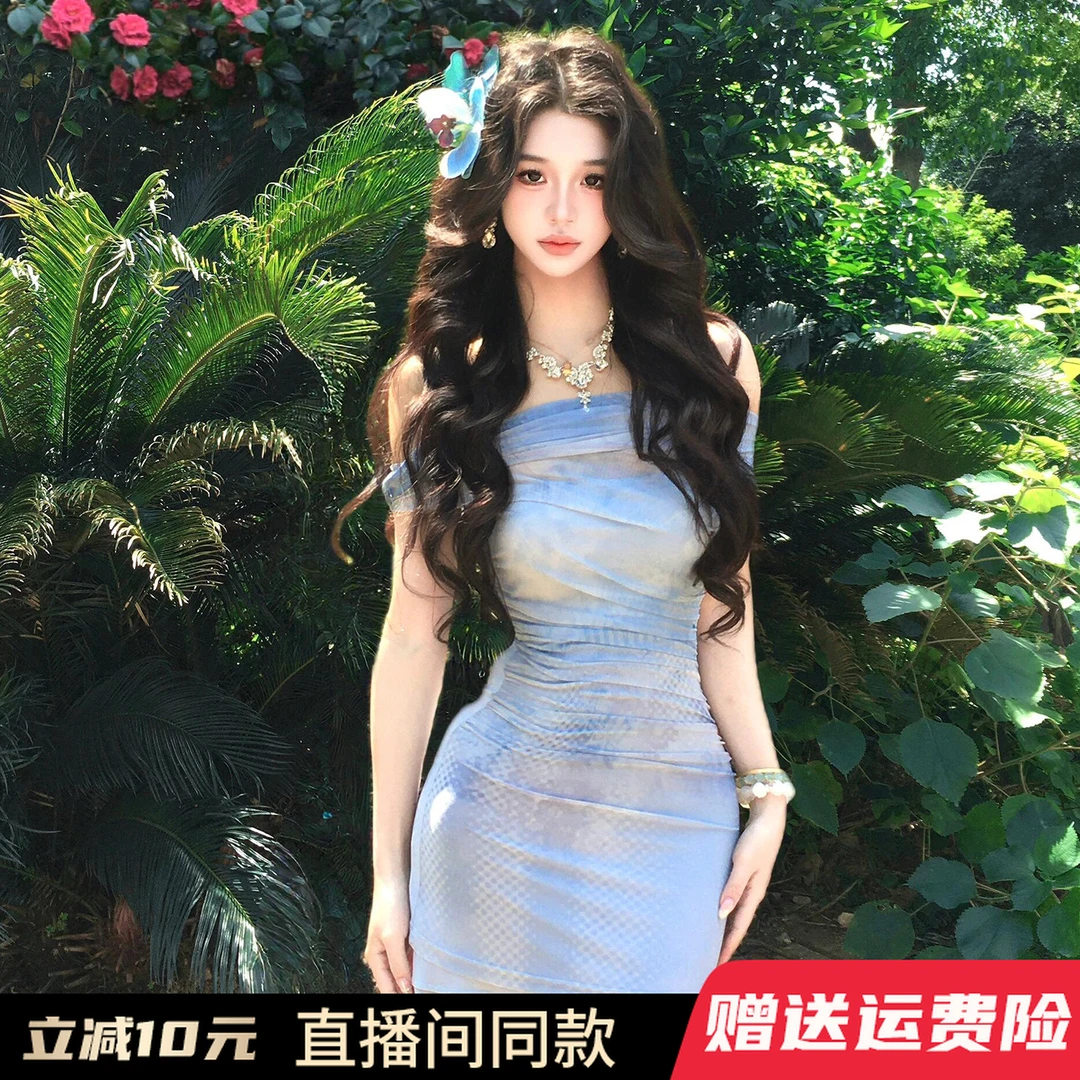 蓝色一字肩薄纱连衣裙子女早秋爆款2025新款海边度假包臀鱼尾长裙