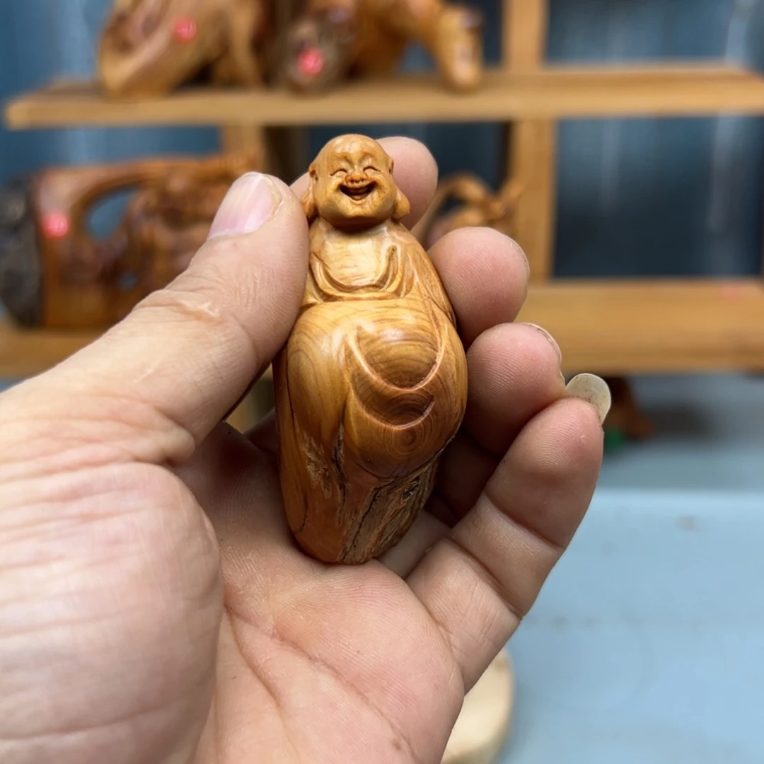 劉***师木崖柏木摆件手把件