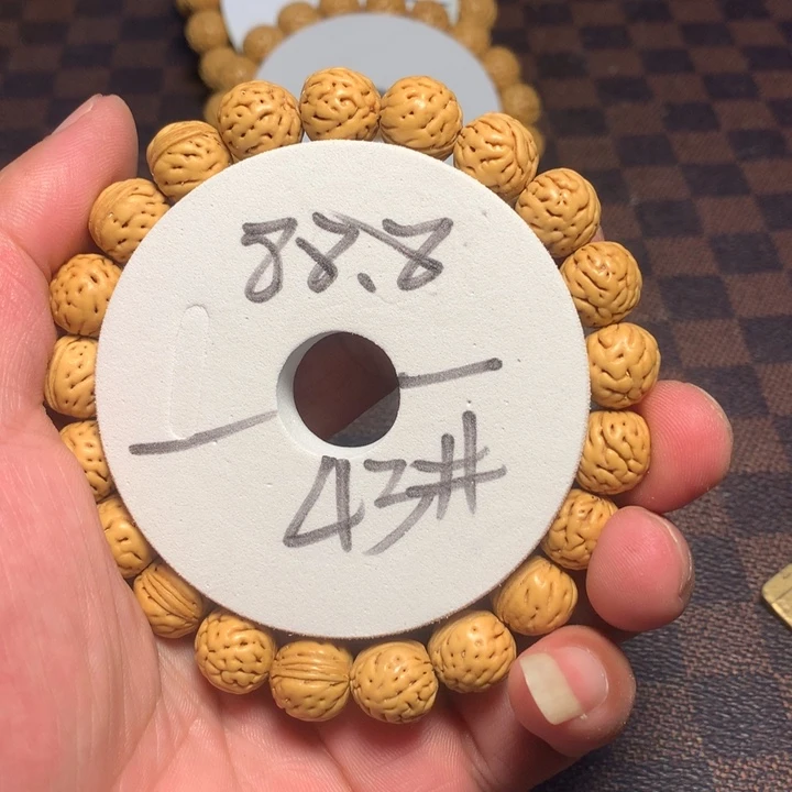 桃核手串43号健健康康了