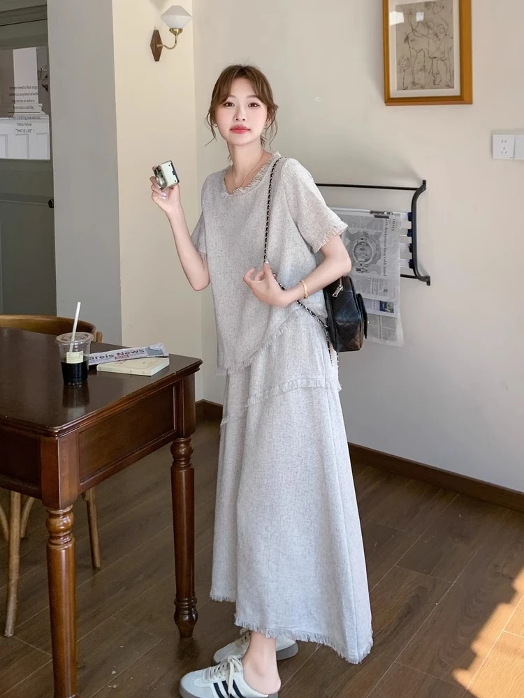 简约大方连衣裙套装女2025夏季韩系独特漂亮流苏上衣半身裙两件套