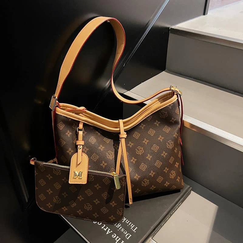 包包女2025新款大容量高级感老花杏色托特包小众不撞款单肩斜挎包