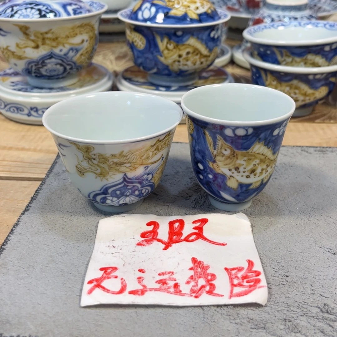 歡***️青花釉里金穿花龙加九鳜杯子