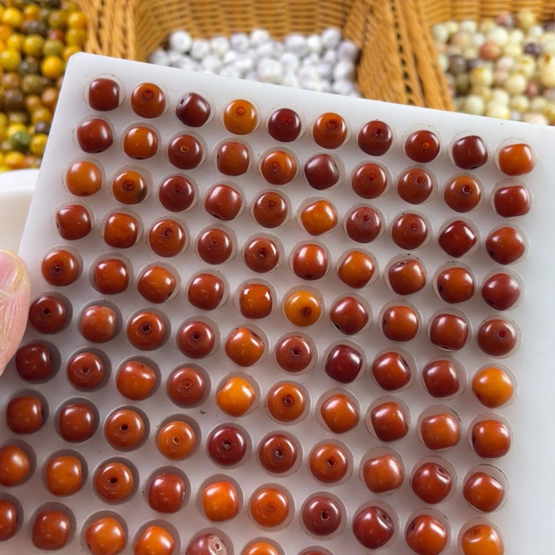 白玉菩提吊坠瑕疵10-9橘红桶珠200颗