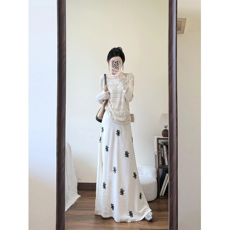 2025年早秋新款氛围感穿搭镂空女慵懒高级感针织上衣设计感半身裙