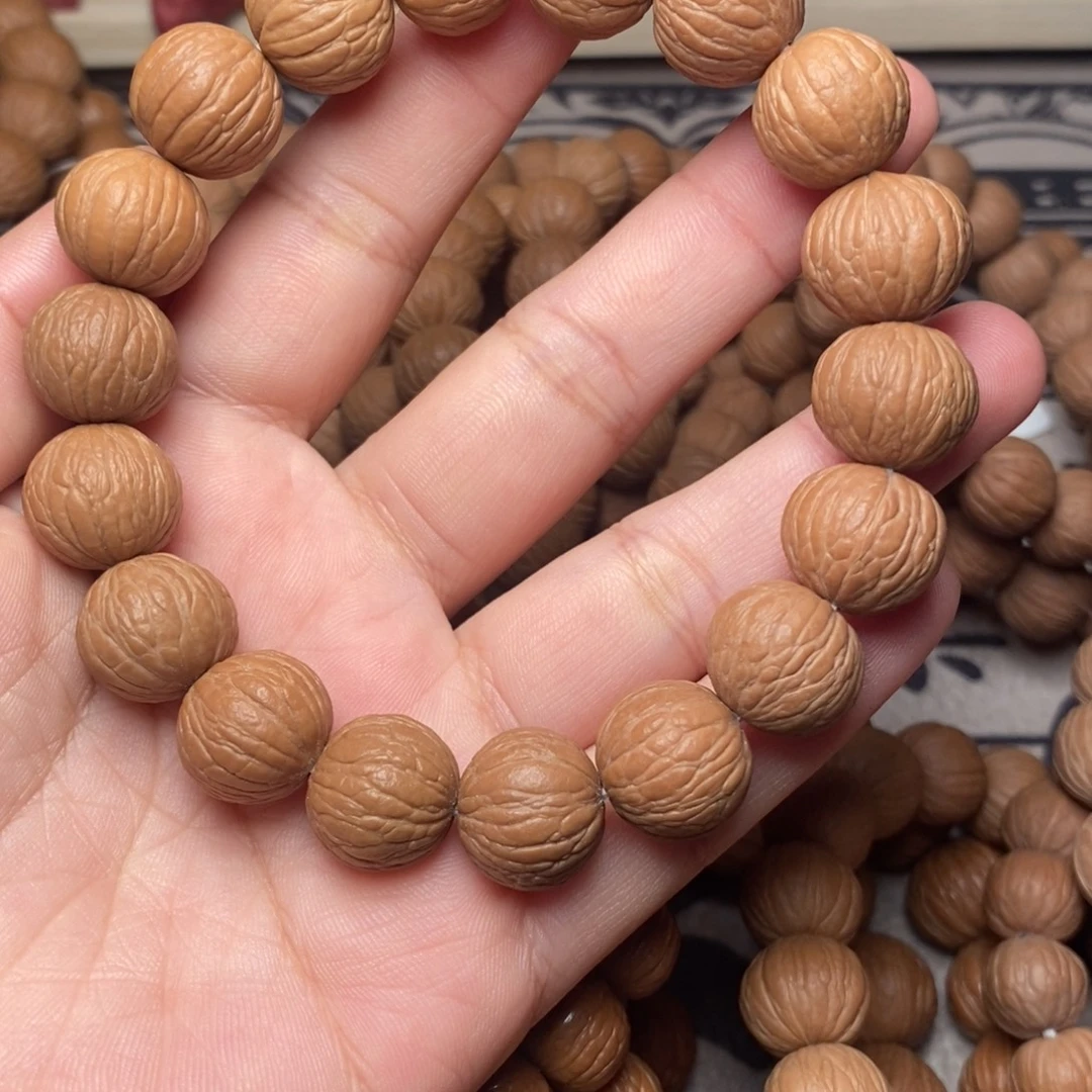 桃核手串14➕凤羽原皮