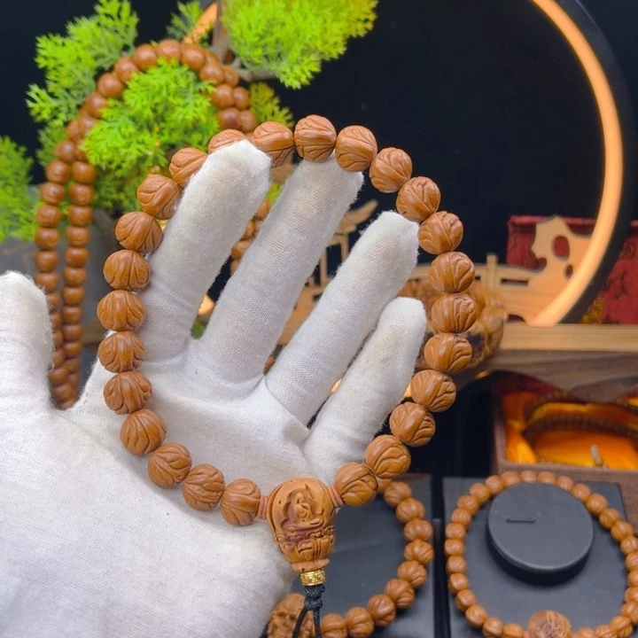 桃核吊坠二**爸野生桃核手持小龙纹1.2