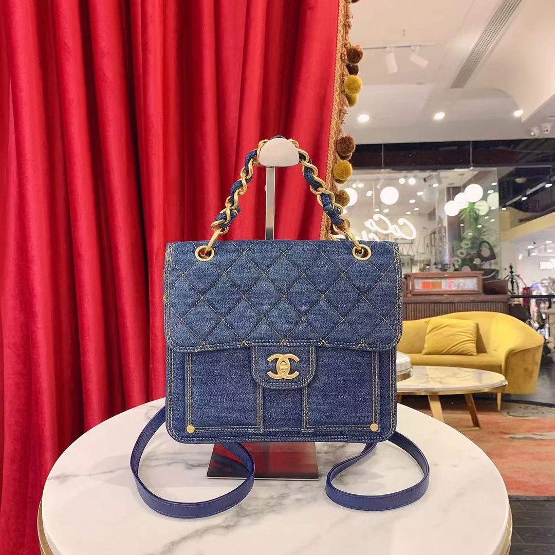 95新 Chanel/香奈儿 23s邮差双肩包书包蓝色牛仔芯片款/87956875