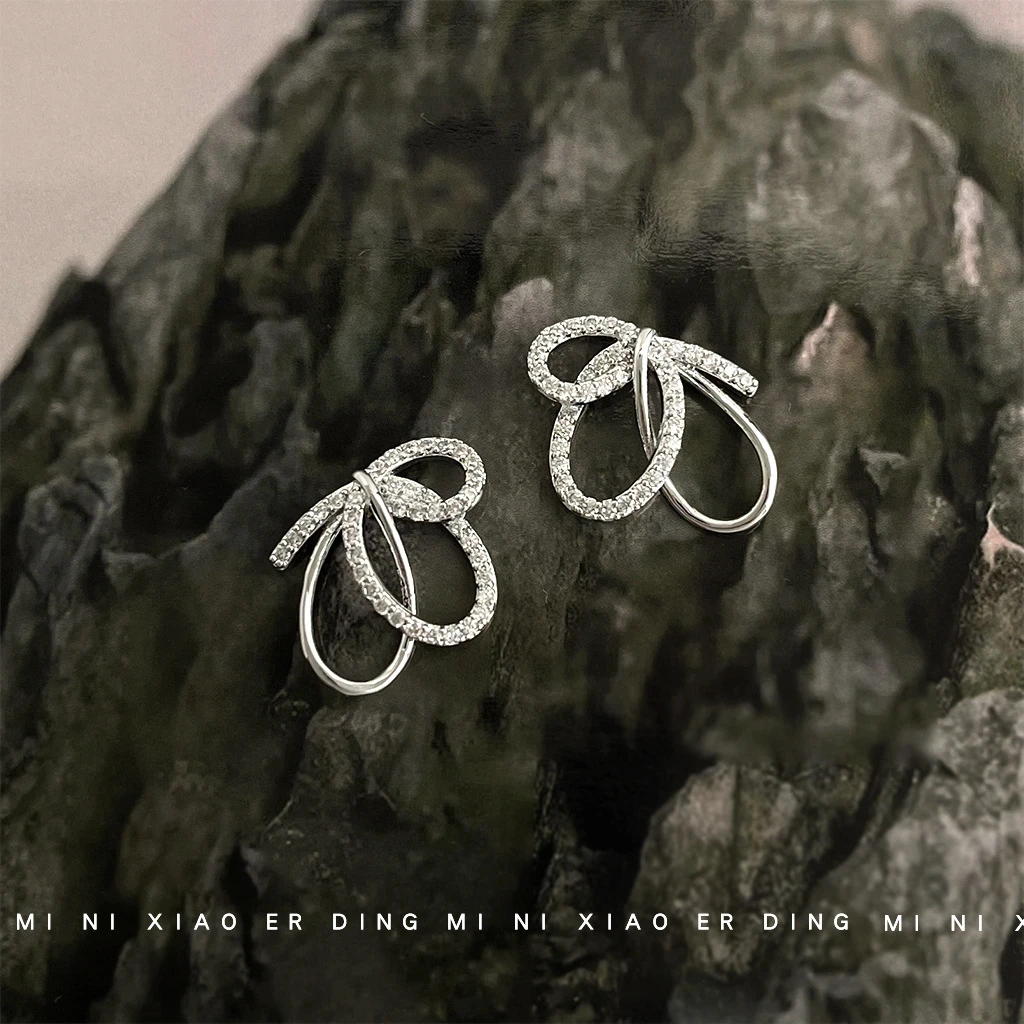 在逃公主~原创设计师款微镶锆石925银针甜美蝴蝶结镂空耳饰女耳钉