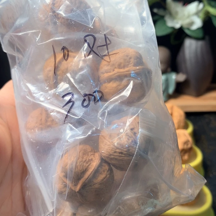 桃核把件见***跑文玩核桃