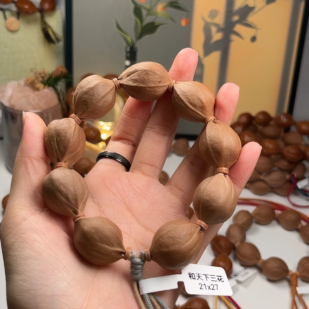 贝***塔橄榄核吊坠2127铁核