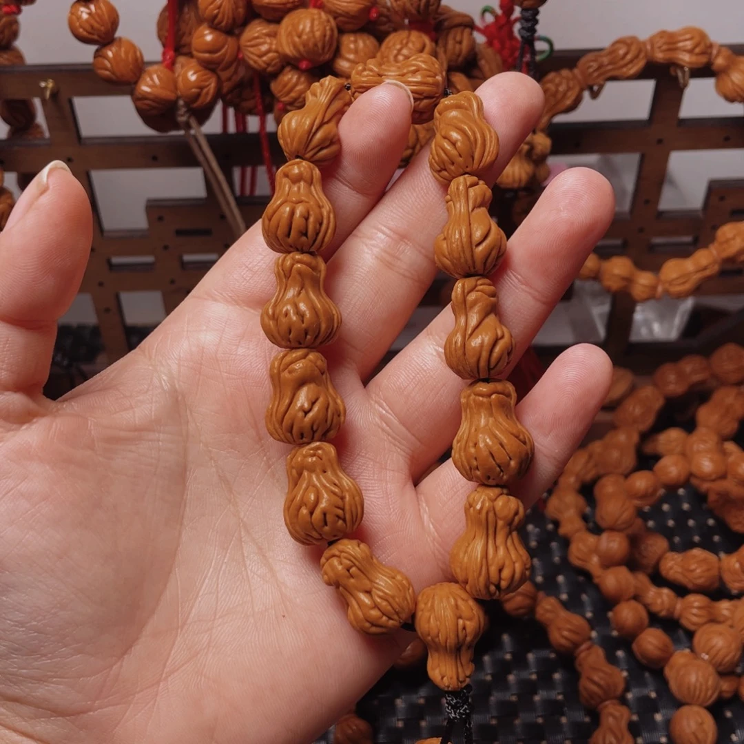 木质类龙纹桃枭手持