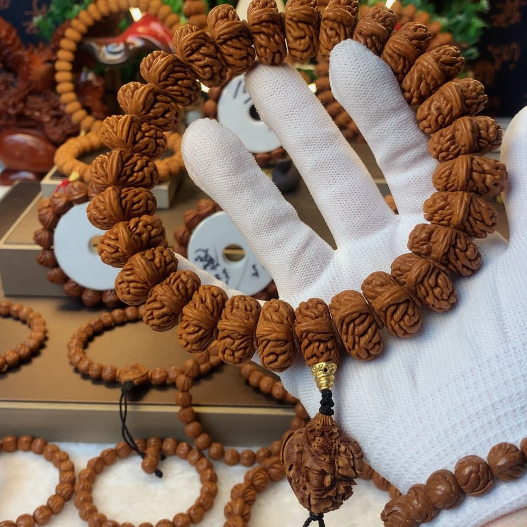 桃核吊坠沉**.秦岭龙纹