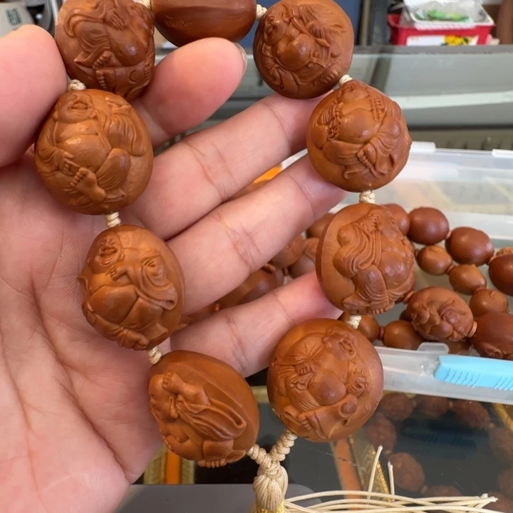 橄榄核手串四花浮雕弥勒