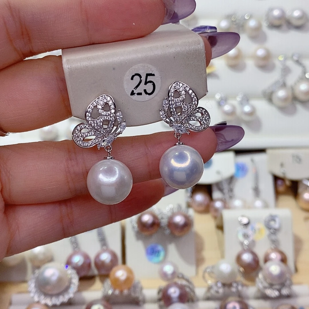 盐***人淡水珍珠银S925镶嵌耳饰