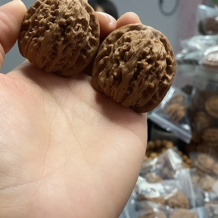 文玩核桃把件41.5红皮四座楼