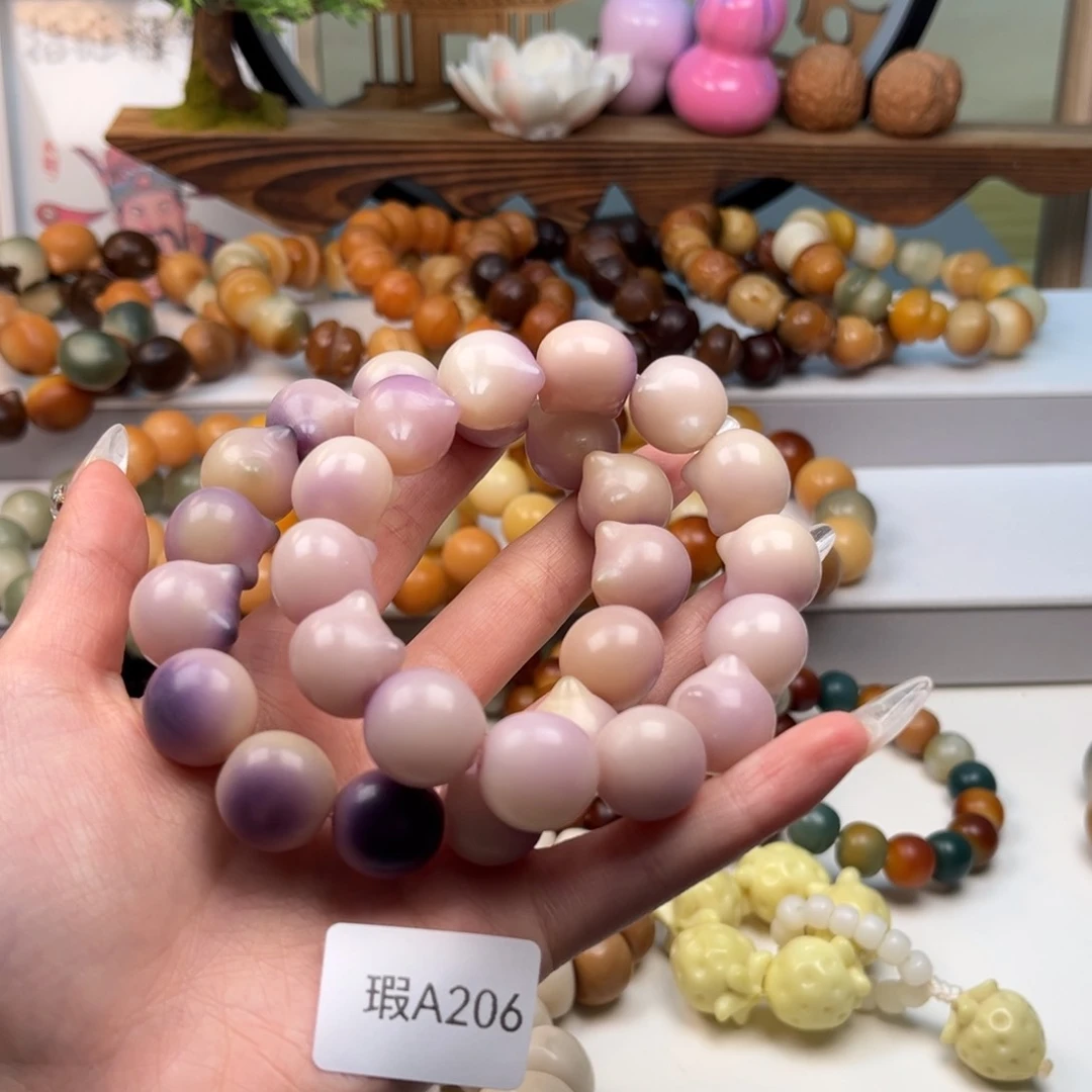 菩提根/象牙果吊坠15mm瑕猫头随机一串a206