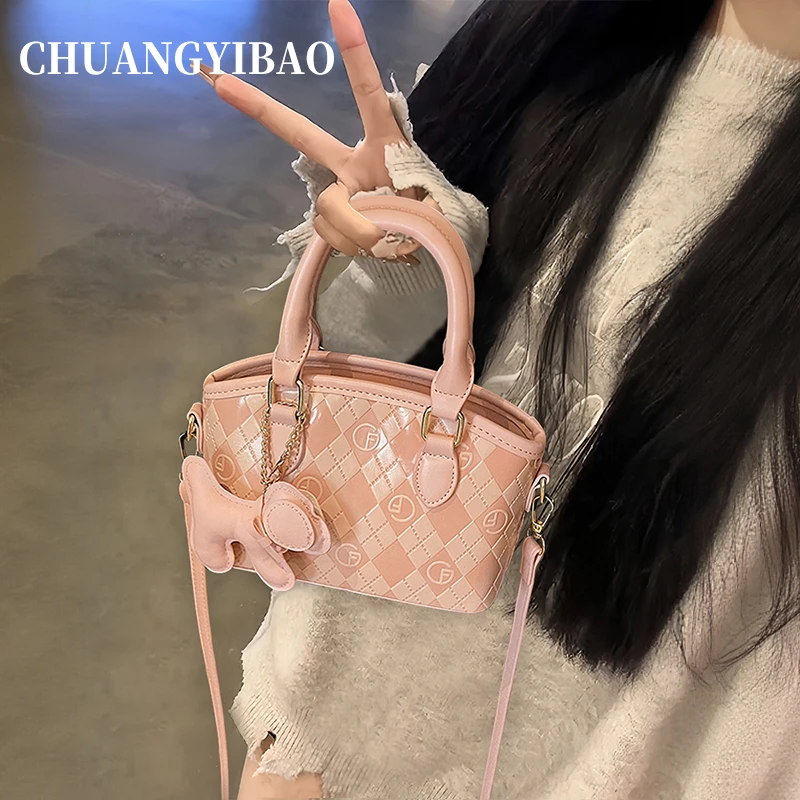 秋冬粉色手提菜篮子包女2025设计师款同款轻奢小众高级质感斜挎包