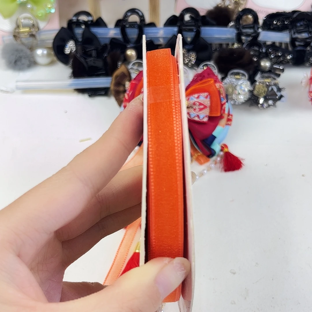 布艺非金属橘色珍珠纱0.6的1和2.5的3.8各50码