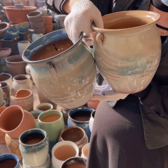 紫砂花盆高21口18。