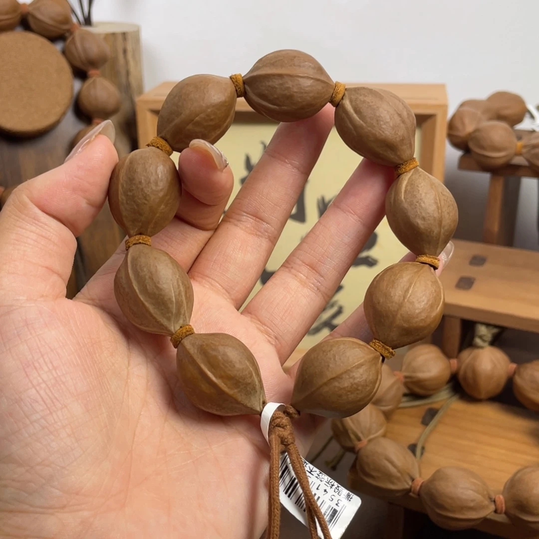 熄***花手串/手链橄榄核20*28.5梅林铁核
