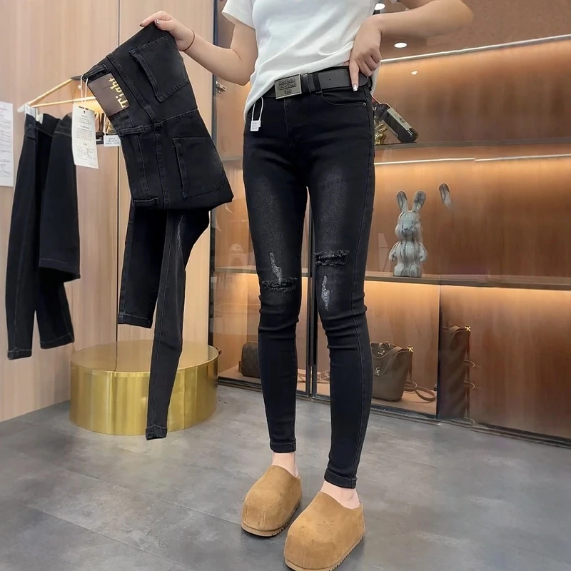 2025年春季新款高腰窄版显瘦牛仔裤大码女装流行修身铅笔小脚裤子