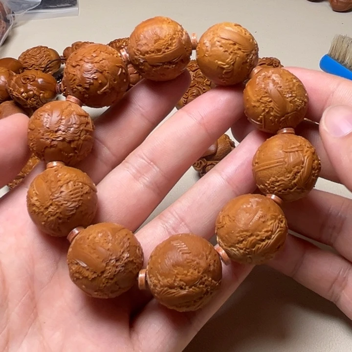 l***n手串橄榄核锦绣山河