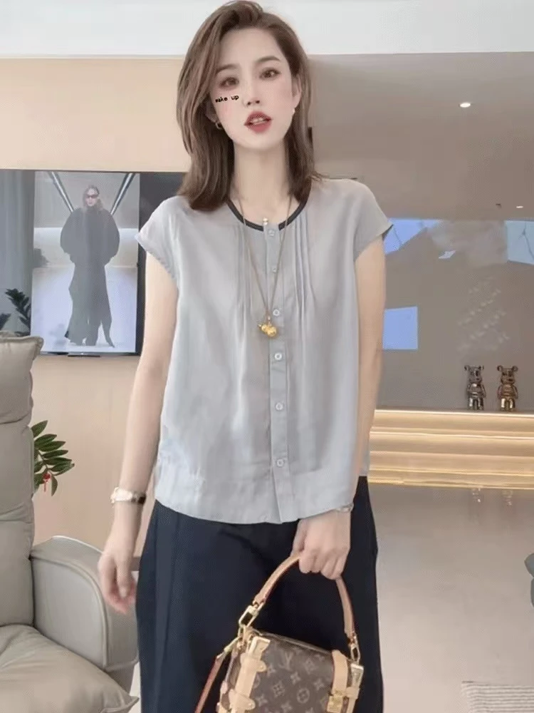 夏季透气舒适圆领夏季短袖上衣时尚显瘦法式镂空无袖衬衫千金风