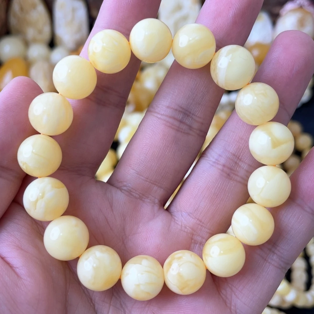 琥珀手串未镶嵌12+俄料妖白花蜡圆珠手串