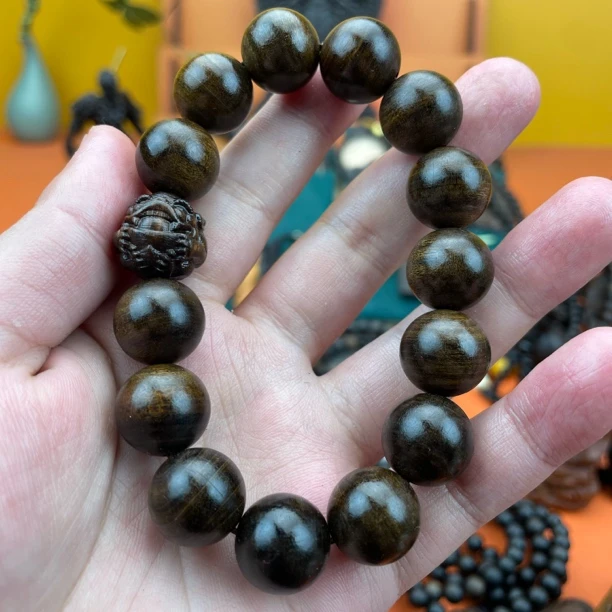 《新款1.5貔貅手串》巴布亚贡木天然木雕手链