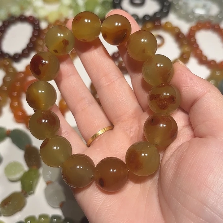 桃***夭未镶嵌蛇纹石玉手串