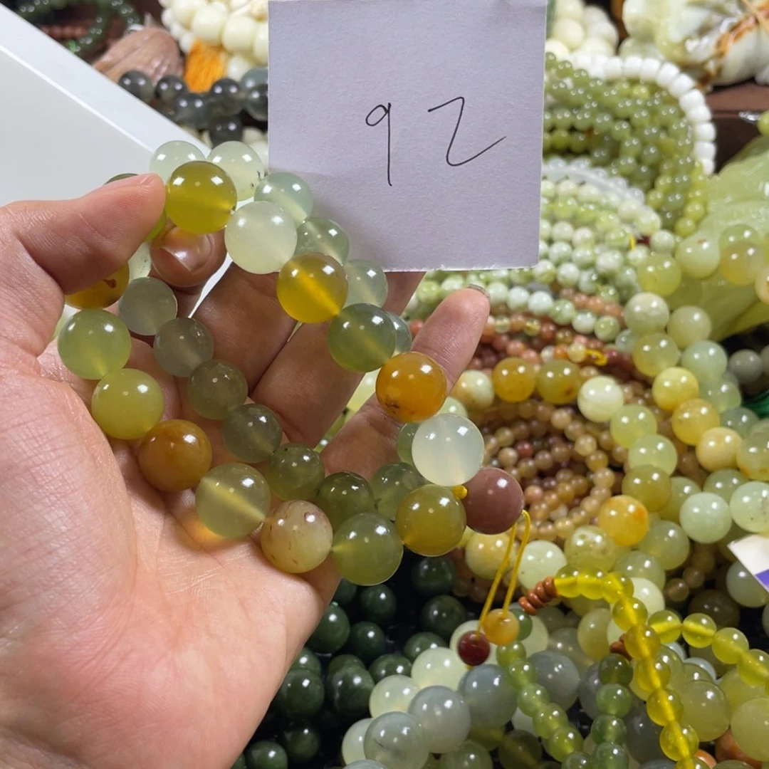 多***安未镶嵌蛇纹石玉手串